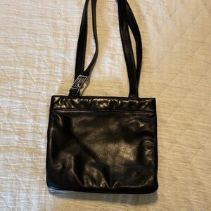 Ralph Lauren Black Leather Purse with Silver Logo on the leather strap.